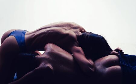 Two beautiful woman with sexy butt. Sensual womans ass and her water drops. Big two butt in sensual night. Female beautiful body and sexuality ass. Stripper provacation girls sexy body and buttの写真素材