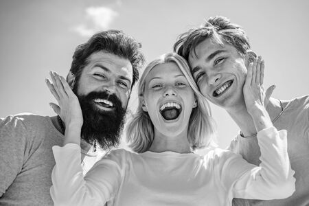Team of best friends spend their carefree time communicating. Hipster style. Stylish men. Summer....