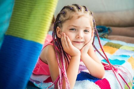 Cute little girl on camp. Kids camping.の写真素材