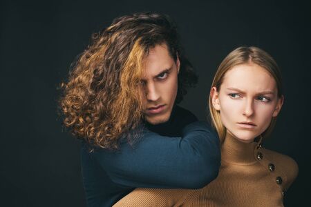 Fashionable picture of young people. Fashion couple.の写真素材