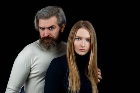 Sensual couple in love. Fahion couple on black isolated. Secrets fantasy. Young vogue couple in love...