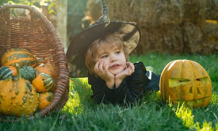 Portrait of Halloween child boy on nature background. Little child have fun on fresh air. Child care.の写真素材