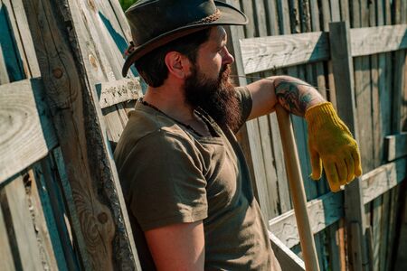 Western cowboy portrait. I love our moments in the countryside. Summer farming.の写真素材