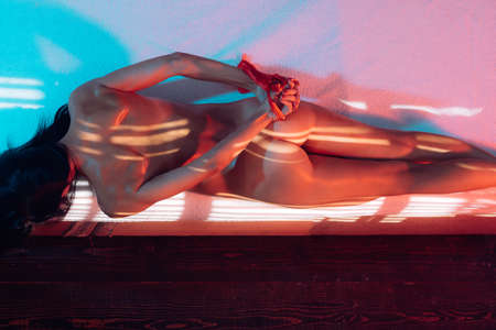 Sexual bdsm toy. Woman with hands tied. Playing bdsm games.の写真素材