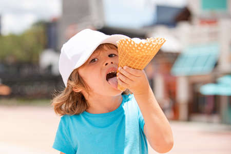 Ice cream child. Funny kids eating ice cream on the street.