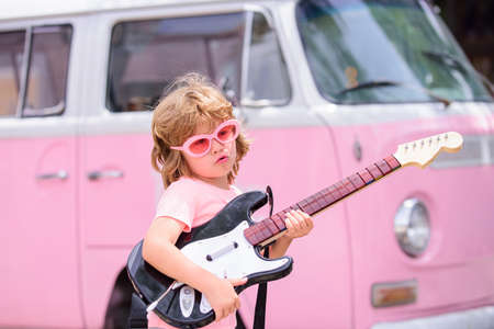 Kid rock musician with guitar at pink bus.の写真素材