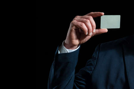 Hand holds a credit card.の写真素材