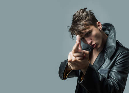 portrait of bearded male with retro style using standing in urban setting, man dressed in stylish clothes.の写真素材