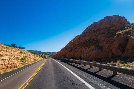 Road panorama on sunny summer day. Empty asphalt highway.の写真素材