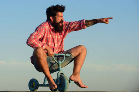 Funny bike. Old man acting like a kid,