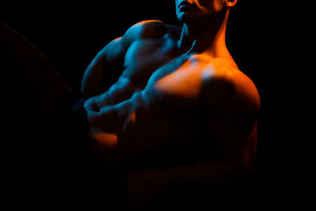Muscular man body and strong muscles. Sexy gay with naked torso. Shirtless undress nude male model.の写真素材