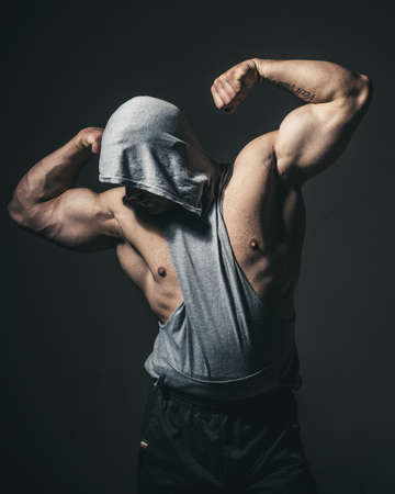 Muscular man body and shoulder muscles. Sexy gays with muscle. Strong male model.