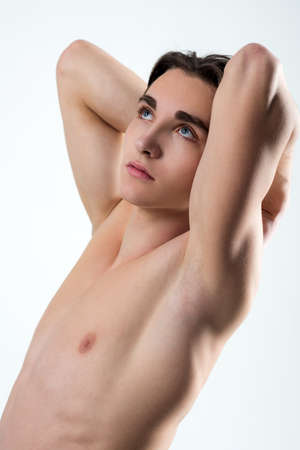 Muscular young guy with a bare torso.の写真素材