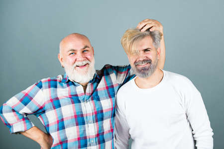 Old father and son. Elderly grandfather. Senior man Granddad. Older younger generations.