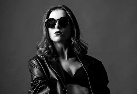 Sexy woman with American football helmet. Woman protection.の写真素材