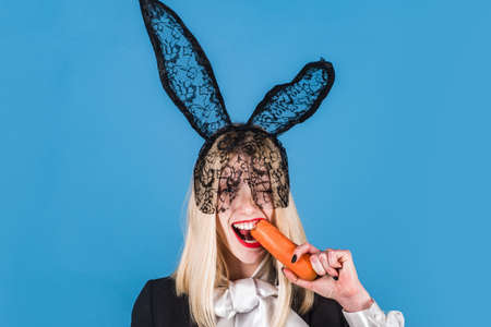 Ready for the party. Happy Easter Pretty, trendy woman is wearing bunny ears on heads. Easter...