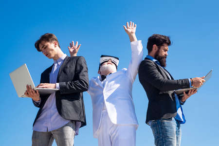 Business teamwork. Coworkers. Team with laptop and vr. Business people senior old young. Businessman...