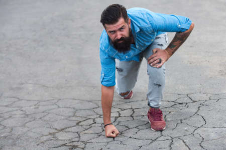 Leadership concept. Man power.  fist cracked ground. Male leader.