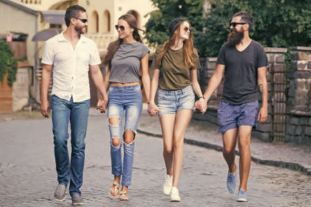 Group of friends travel around in city. Concept about youth and weekend.の写真素材