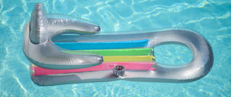 Inflatable mattress on sea water background. Summer vacation and travel to ocean. activity and joy...