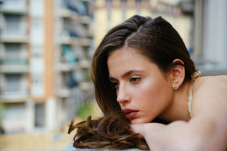 Sad woman outdoor. Luxury portrait. City girl. Fashion and beauty. Street style vogue.の写真素材