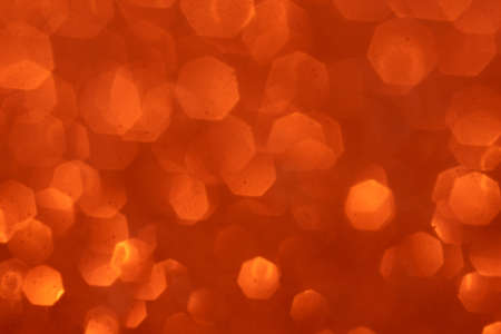 Red blurred bokeh background. Concept for New Year, Christmas, and All Celebrations.