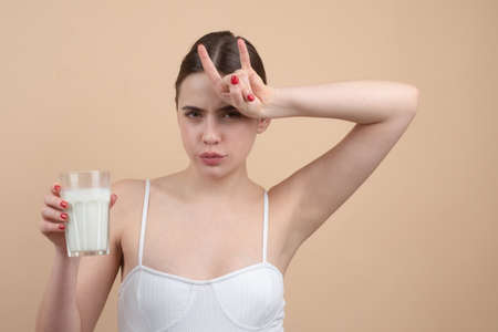 Milk lactose. Vegan people concept. Vegetarian woman. Take in veggie. Cow goat girl, healthy lifestyle.の写真素材