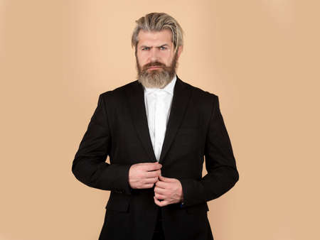 Business fashion. Man in black suit. Luxury classic suits, vogue. Male in classic suit, shirt and tie. Businessman concept.の写真素材
