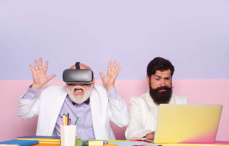 Business vr teamwork. Business office coworkers. Team with laptop and virtual reality. Business...