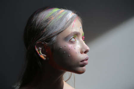 Beauty color makeup. Abstract make up. Vogue style. Face art and creative make-up.の写真素材