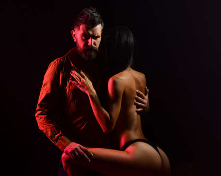 Sexy couple body. Young naked woman and bearded man.の写真素材