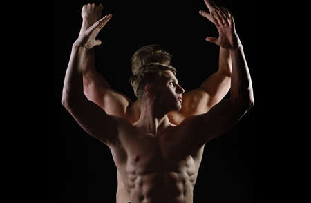 Strong athletic men, fit male models. Sexy muscular men with bare naked body torso. Man naked torso...