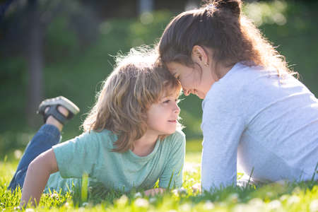 Happy family mother and child son on nature.の写真素材
