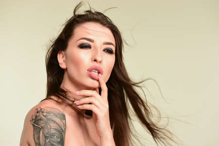 Beautiful hispanic girl. Woman with beauty face, facial skin portrait.の写真素材