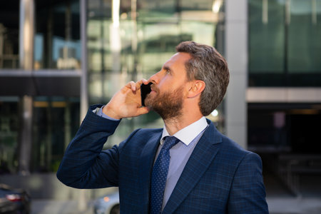 Business man using smartphone. Businessman talking on phone.の写真素材