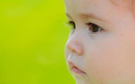 Head baby close up. Kids macro cropped face, little boy portrait.