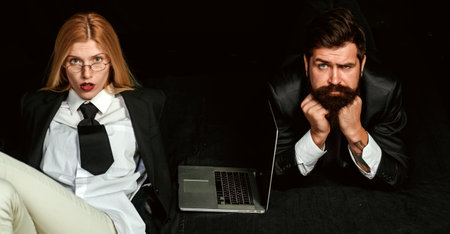 Business concept. Serious business workers working together using laptop. Boss and secretary.の写真素材