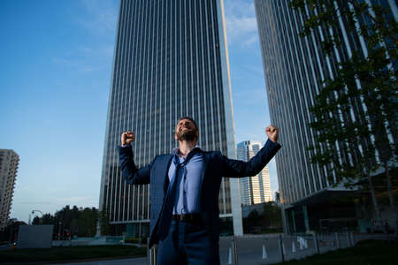 Angry businessman. Screaming furious business man getting mad. Bad business news.の写真素材