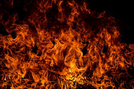 Fire blaze flames on black background. Fire burn flame isolated, abstract texture. Flaming explosion...