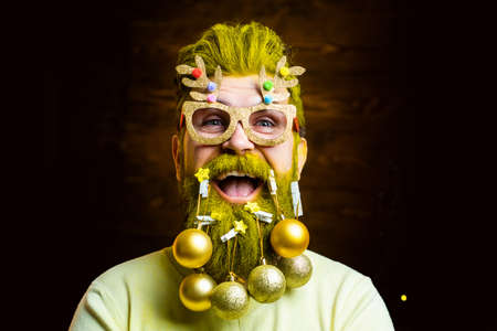 Christmas face of bearded santa. Christmas people celebration New Year. Portrait of a funny Santa Claus.の写真素材