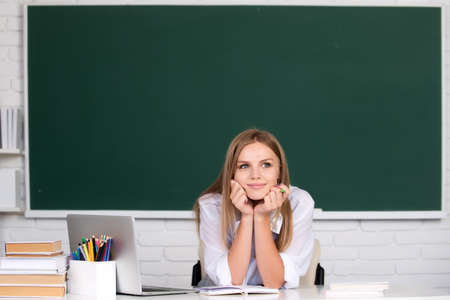 Female student on lesson lecture in classroom at high school or college. Back to school.の写真素材