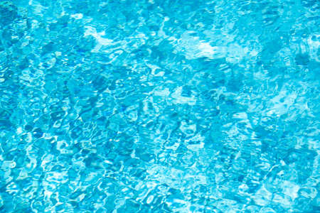 Water in swimming pool, background with high resolution. Wave abstract or rippled water texture.