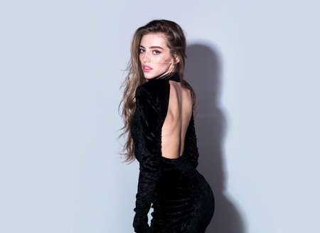 Woman with beauty face, facial portrait. Beautiful tender sensual young girl. Fashion model isolated in studio.の写真素材