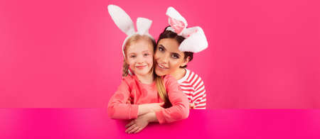 Happy girls with bunny ears. Little sister celebrate easter. Easter banner with copy space.