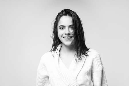 Beautiful young woman with clean fresh skin. Young women enjoy morning.の写真素材