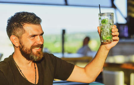 Happy elegant man drinking beer. Beer pubs and bars. Man holding mug of beer.の写真素材