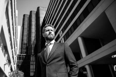 Manager in a luxury modern open space business center. Successful business man outside.の写真素材