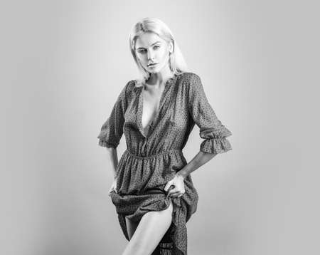 Fashion style. Woman in red dress. Sensual girl i trendy clothes.の写真素材