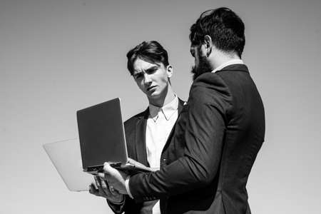 Coworkers. Business teamwork concept. Team with laptop. Business people. Businessman working together.の写真素材