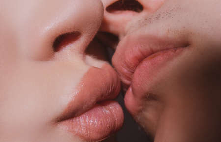Sensual kiss close up. Couple in love kissing passionately.の写真素材